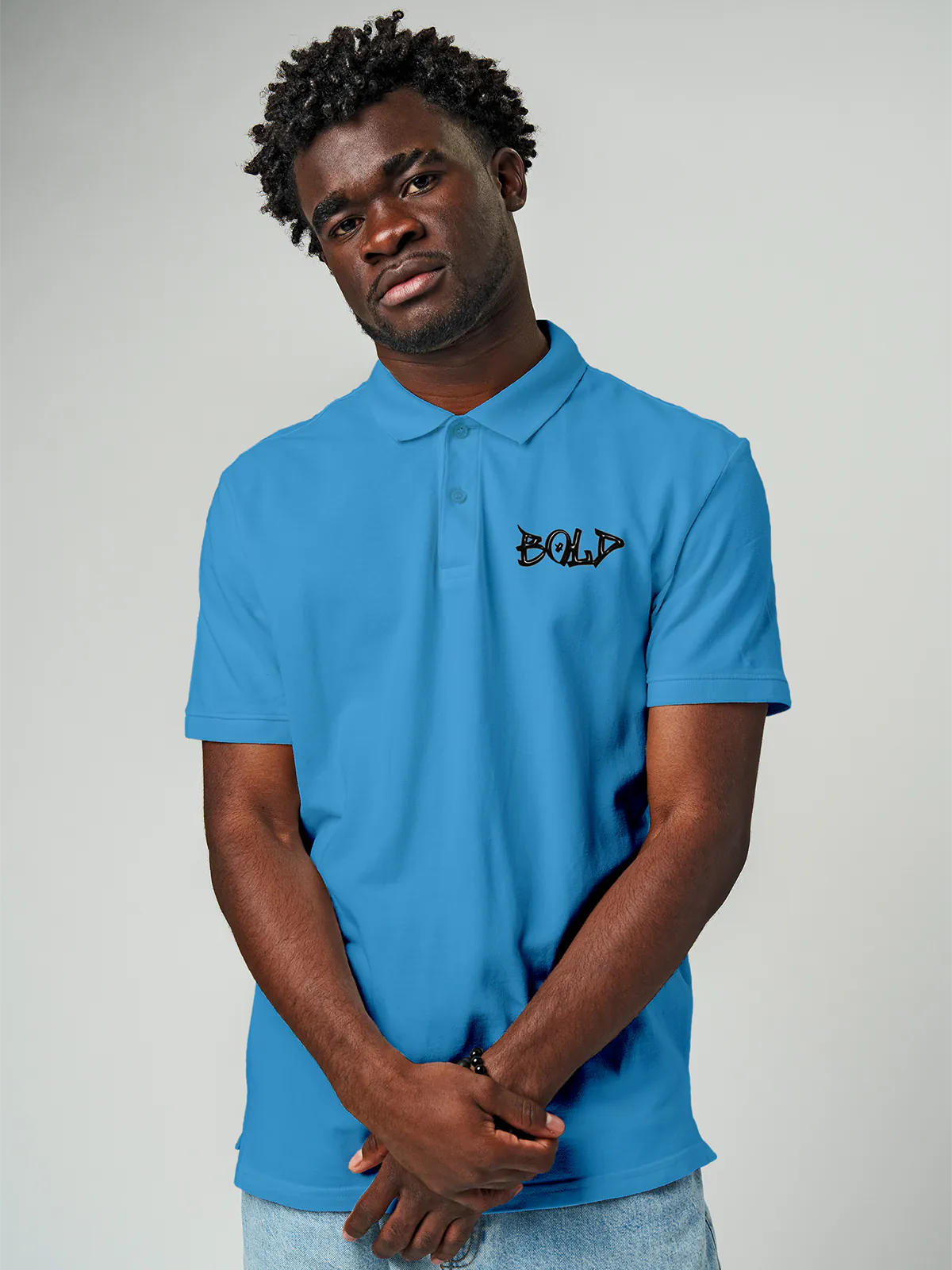 Model wearing Men's Blue Polo T-shirt with Bold, offering effortless style and premium comfort