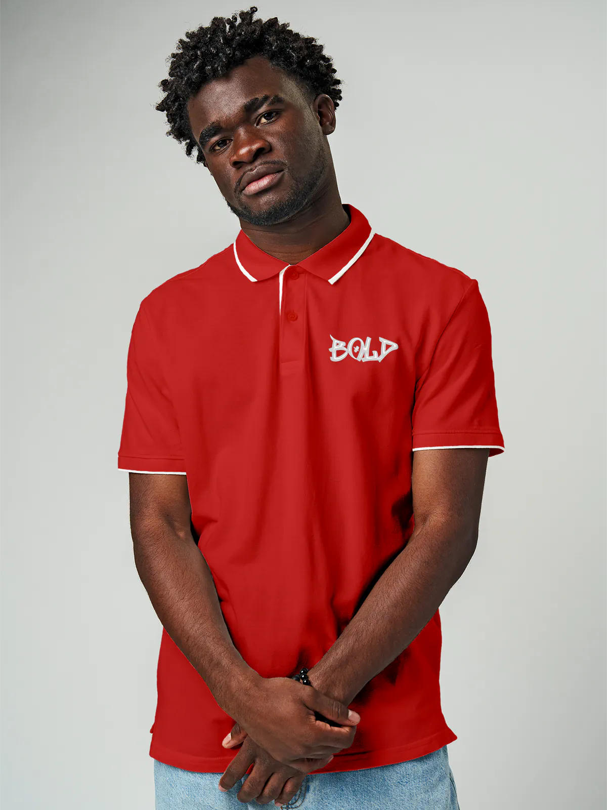 Model wearing Men's Red Polo T-shirt with Bold, offering effortless style and premium comfort