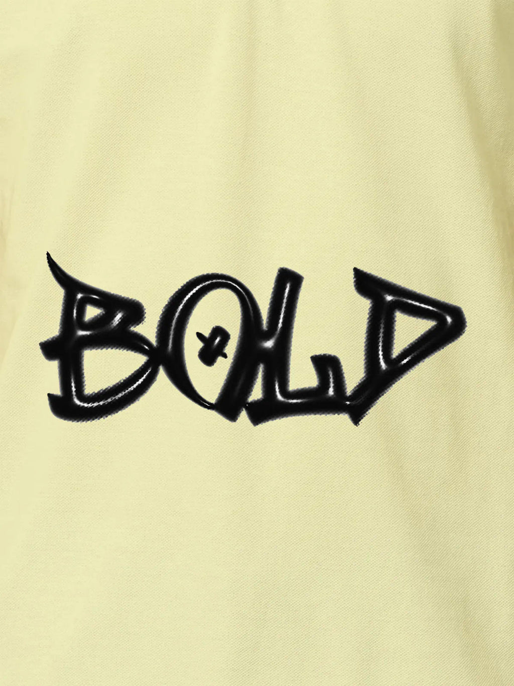 Close up of 'Bold' on Men's Yellow Polo T-shirt, highlighting intricate details and vibrant print.