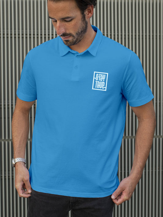 Fighterhero Polos: Model wearing Men's Blue Polo T-shirt with 'Stay True' design