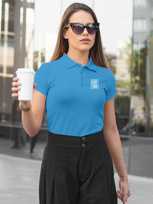 Fighterhero Polos: Model wearing Women's Blue Polo T-shirt with 'Stay True' design