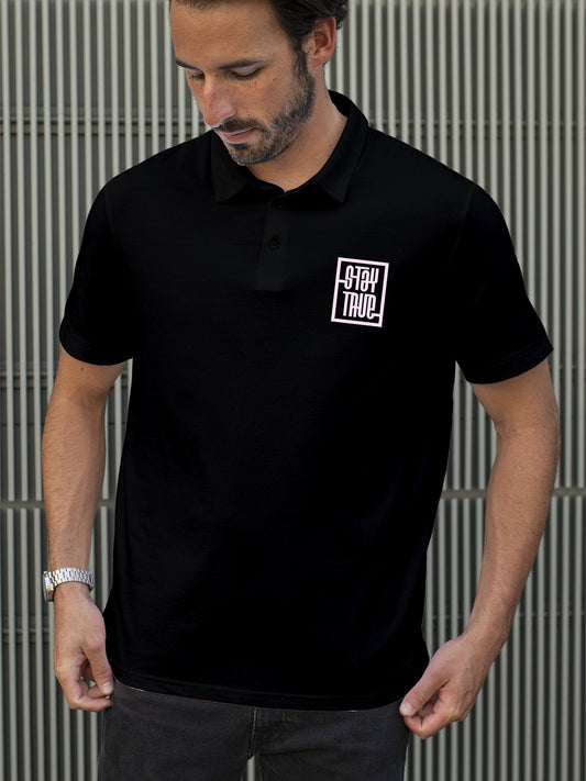 Fighterhero Polos: Model wearing Men's Black Polo T-shirt with 'Stay True' design