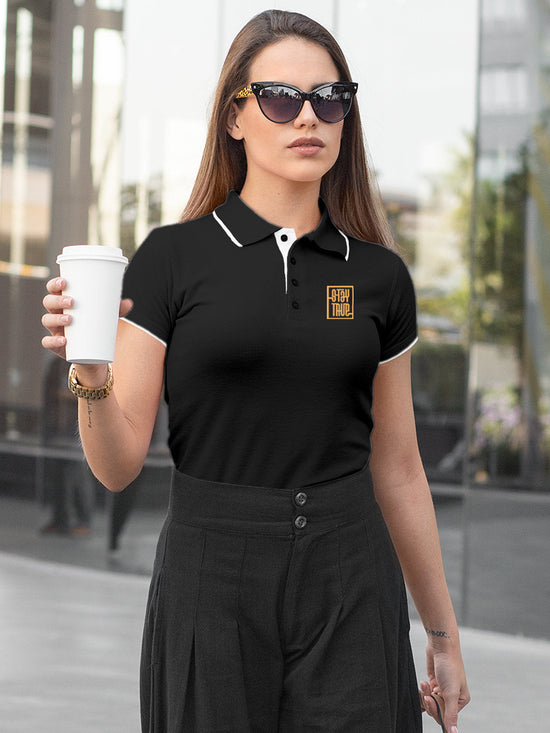 Fighterhero Polos: Model wearing Women's Dark Grey Polo T-shirt with 'Stay True' design