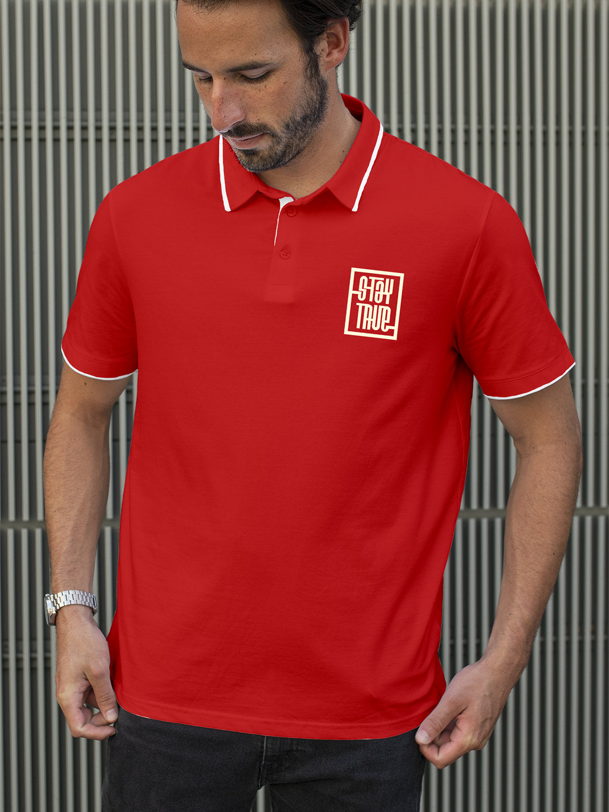 Model wearing Men's Red Polo T-shirt with Stay True, offering effortless style and premium comfort