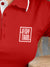 Close up of 'Stay True' design on Women's Red Polo T-shirt, highlighting intricate details and vibrant print.