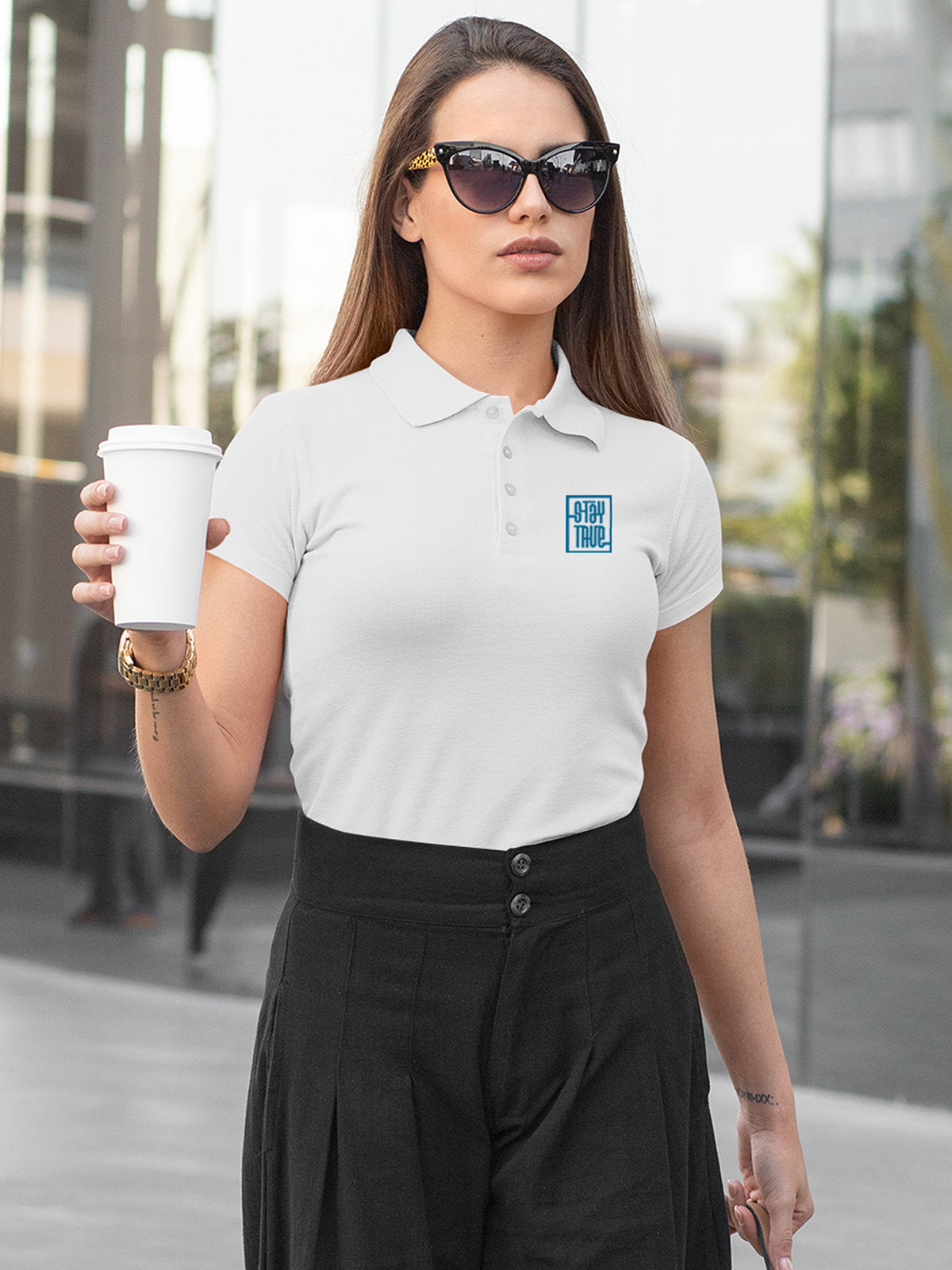 Model wearing Women's White Polo T-shirt with Stay True, offering effortless style and premium comfort