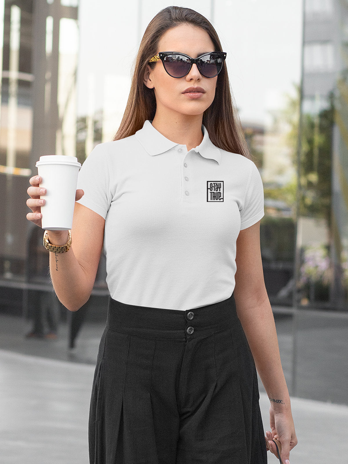 Model wearing Women's White Polo T-shirt with Stay True, offering effortless style and premium comfort