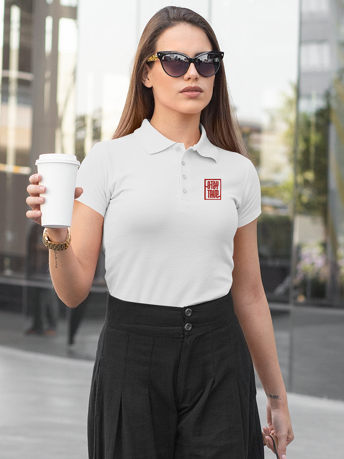 Model wearing Women's White Polo T-shirt with Stay True, offering effortless style and premium comfort