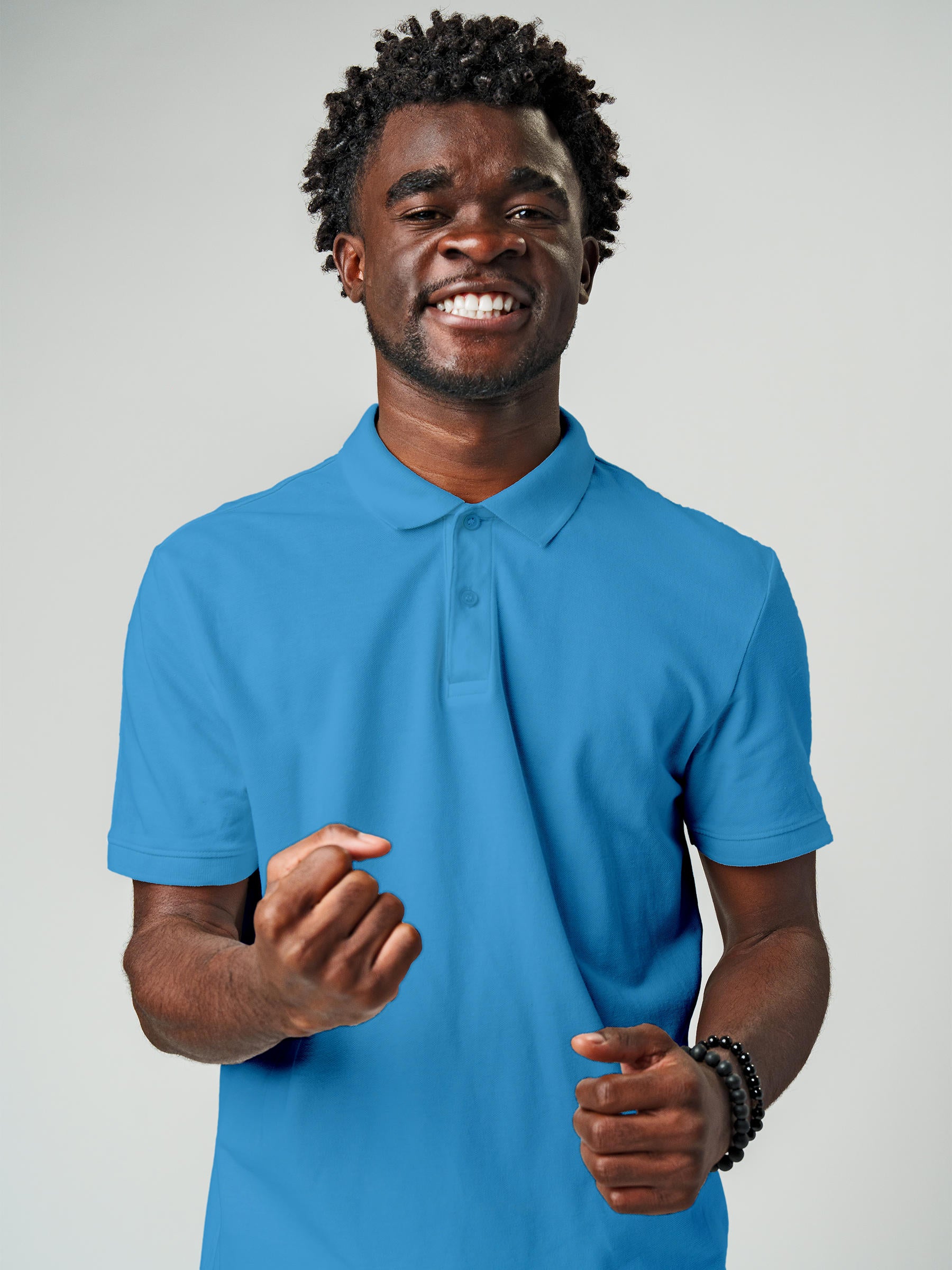 Model wearing Men's Plain Solid Blue Polo T-shirt, offering effortless style and premium comfort