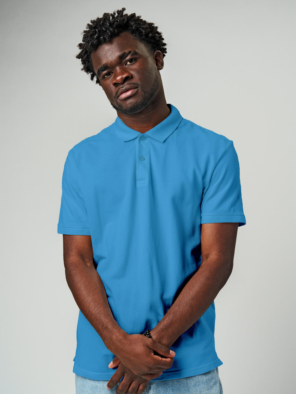 Close up of Men's Plain Solid Blue Polo T-shirt, showing intricate details and texture
