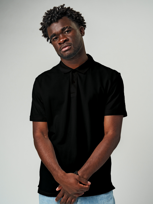 Model wearing Men's Plain Solid Black Polo T-shirt, offering effortless style and premium comfort