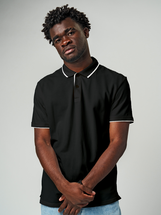 Model wearing Men's Plain Solid Charcoal Grey Polo T-shirt, offering effortless style and premium comfort