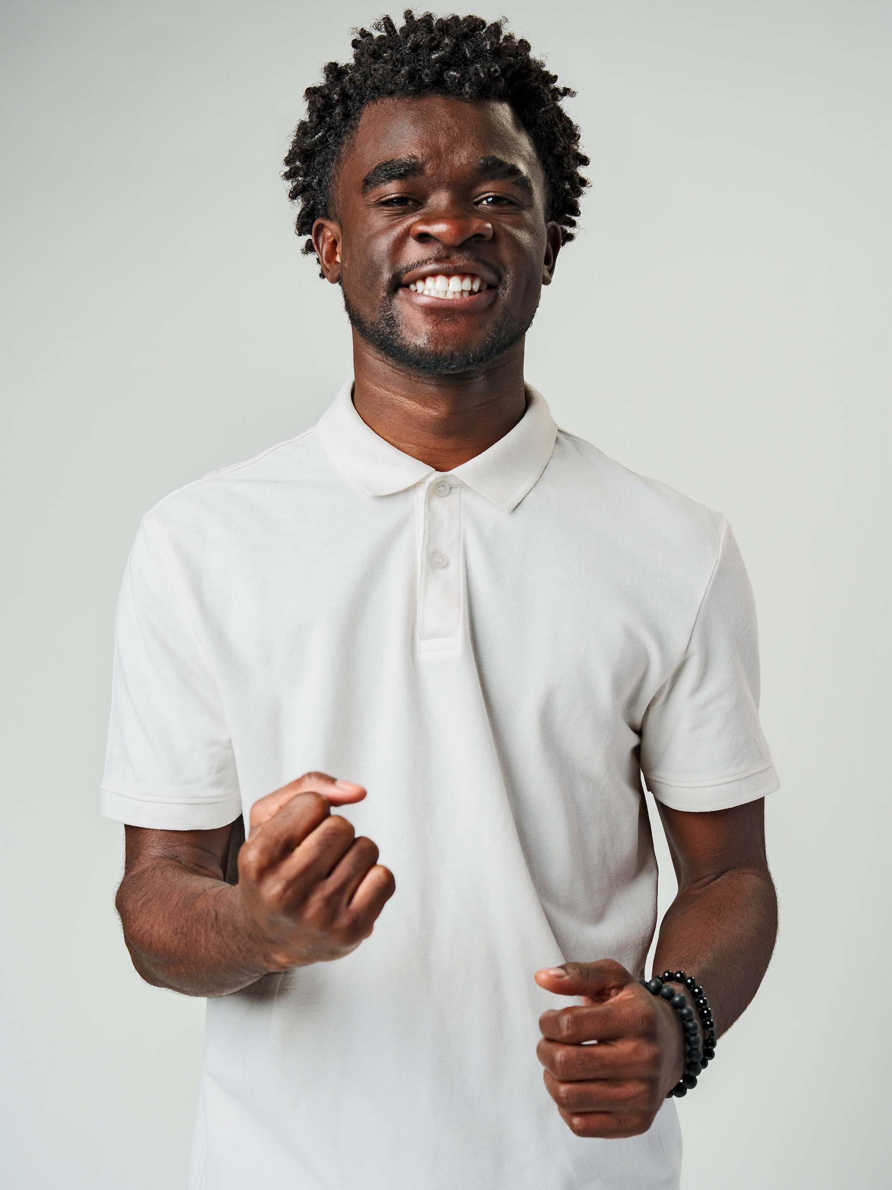 Close up of Men's Plain Solid White Polo T-shirt, showing intricate details and texture
