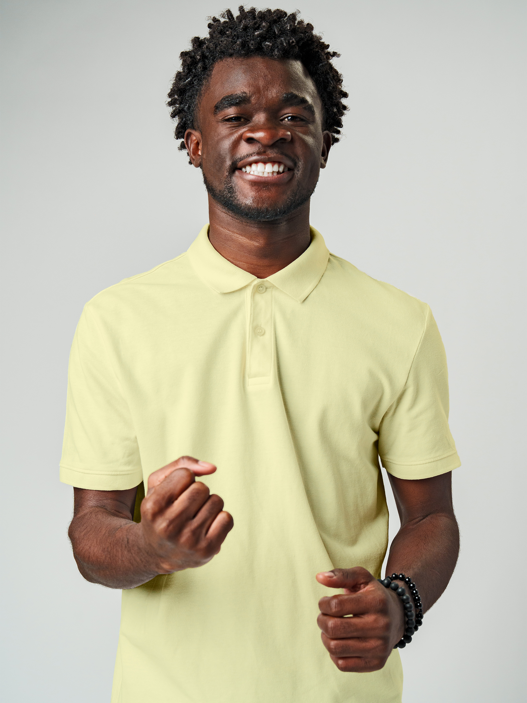 Close up of Men's Plain Solid Yellow Polo T-shirt, showing intricate details and texture