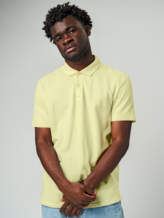 Model wearing Men's Plain Solid Yellow Polo T-shirt, offering effortless style and premium comfort