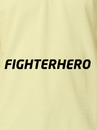 Close up of 'Fighterhero' design on Women's Yellow Polo T-shirt, highlighting intricate details and vibrant print.