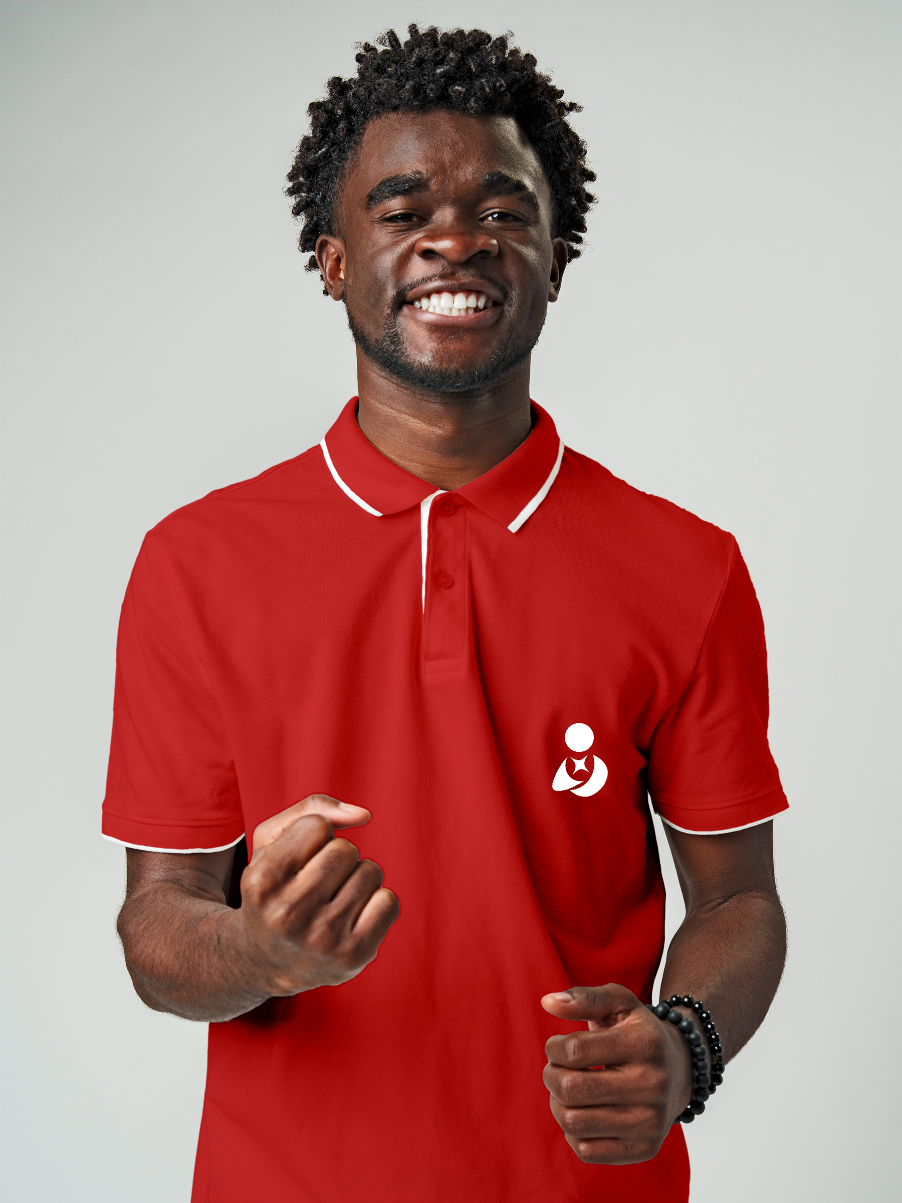 Close up of 'Fighterhero Logo' on Men's Red Polo T-shirt, highlighting intricate details and vibrant print.