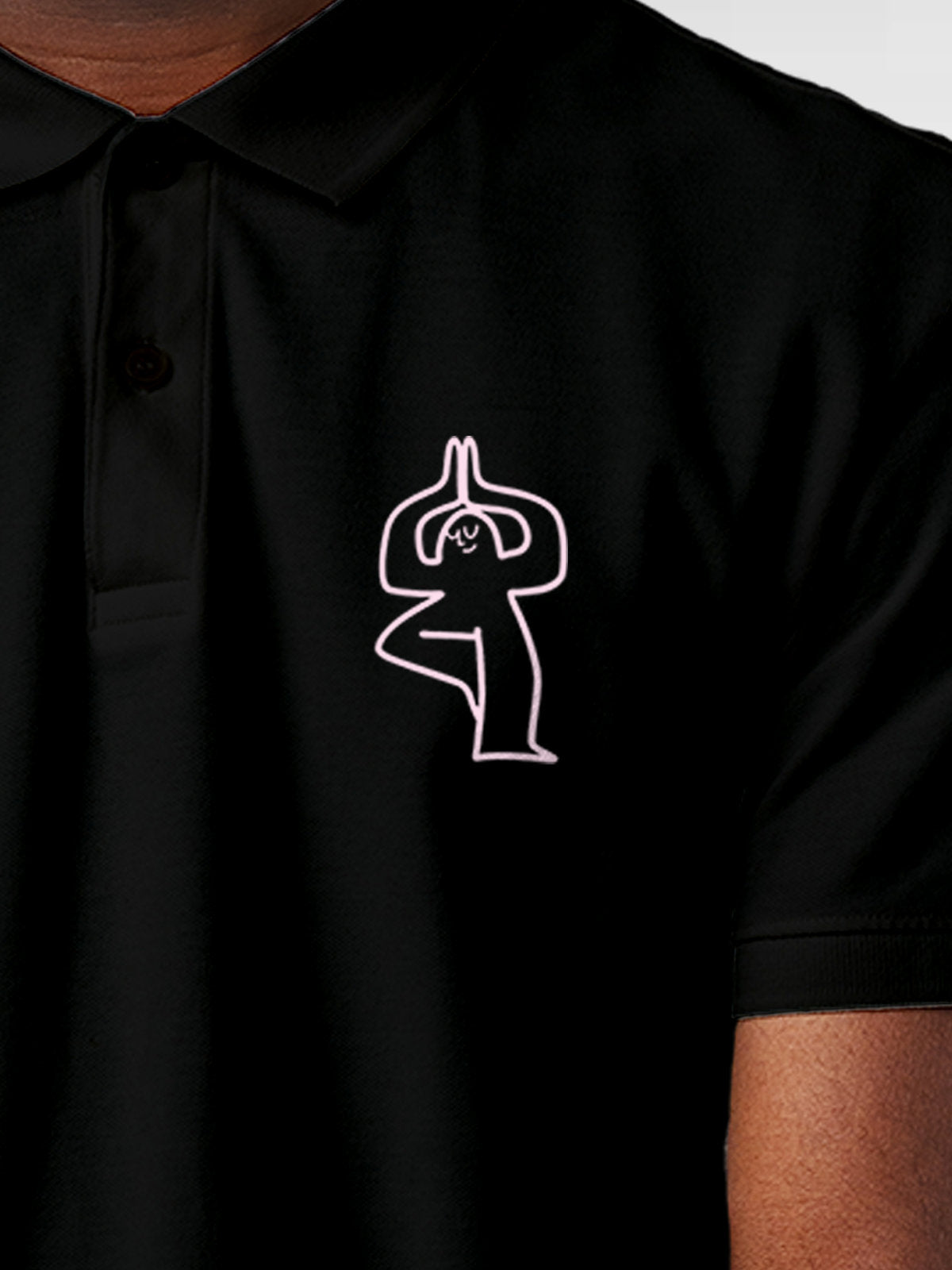 Close up of 'Balance Is A Decision' design on Men's Black Collar T-shirt, highlighting intricate details and vibrant print.