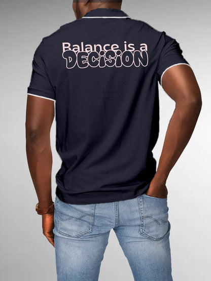 Model wearing Men's Navy Blue Collar T-shirt with the text 'Balance is a decision' printed at the back.