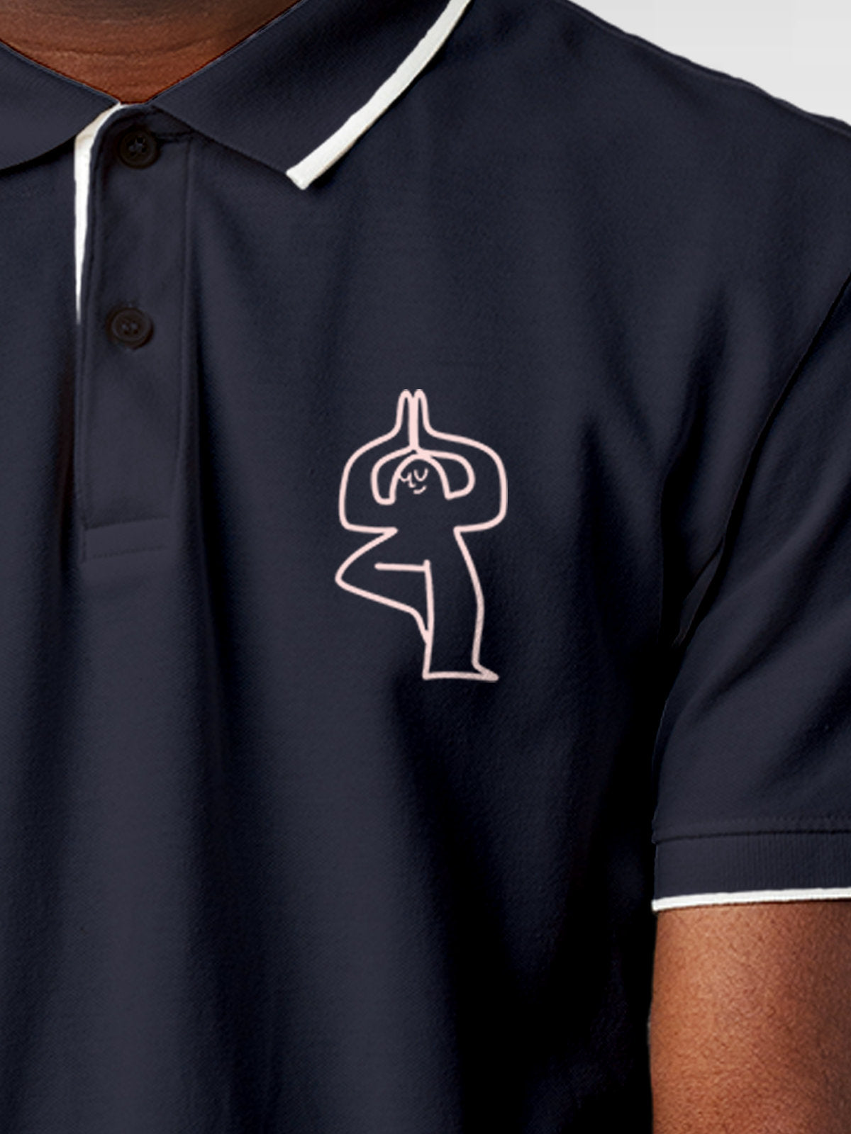 Close up of 'Balance Is A Decision' design on Men's Navy Blue Collar T-shirt, highlighting intricate details and vibrant print.