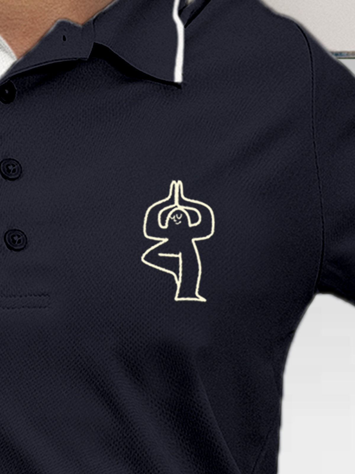 Close up of 'Balance Is A Decision' design on Women's Navy Blue Collar T-shirt, highlighting intricate details and vibrant print.
