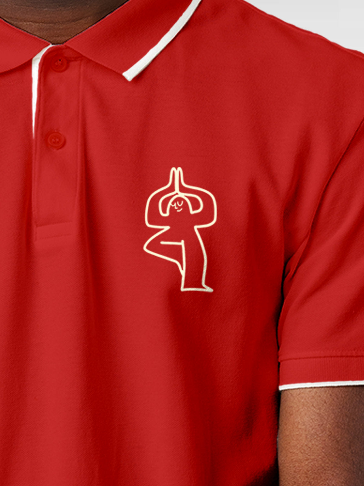 Close up of 'Balance Is A Decision' design on Men's Red Collar T-shirt, highlighting intricate details and vibrant print.