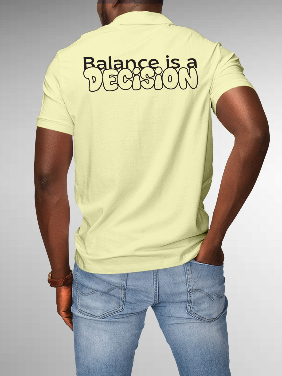 Model wearing Men's Yellow Collar T-shirt with the text 'Balance is a decision' printed at the back.