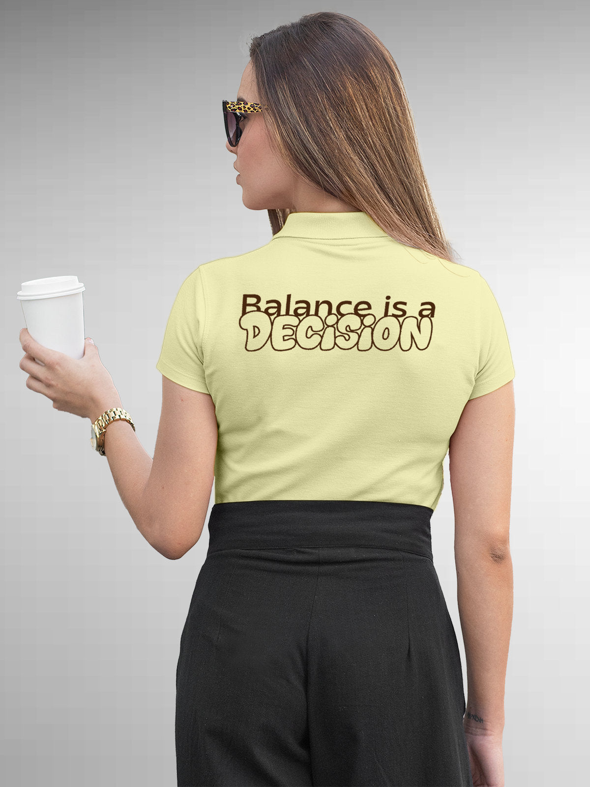 Model wearing Women's Yellow Collar T-shirt with the text 'Balance is a decision' printed at the back.