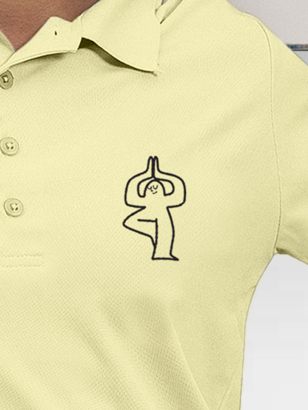 Close up of 'Balance Is A Decision' design on Women's Yellow Collar T-shirt, highlighting intricate details and vibrant print.