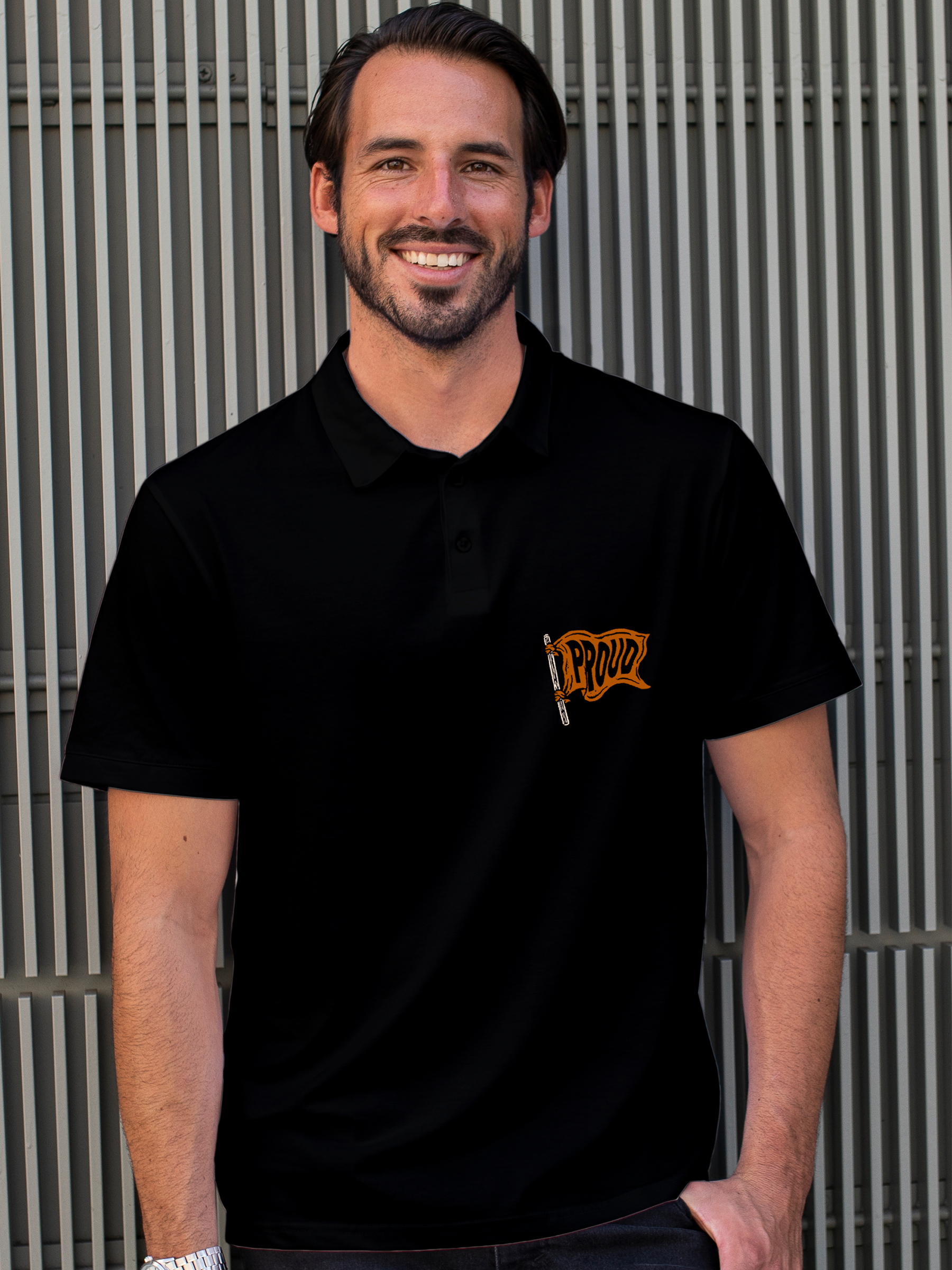 Model wearing Men's Black Polo T-shirt with 'Proud' design, offering effortless style and premium comfort