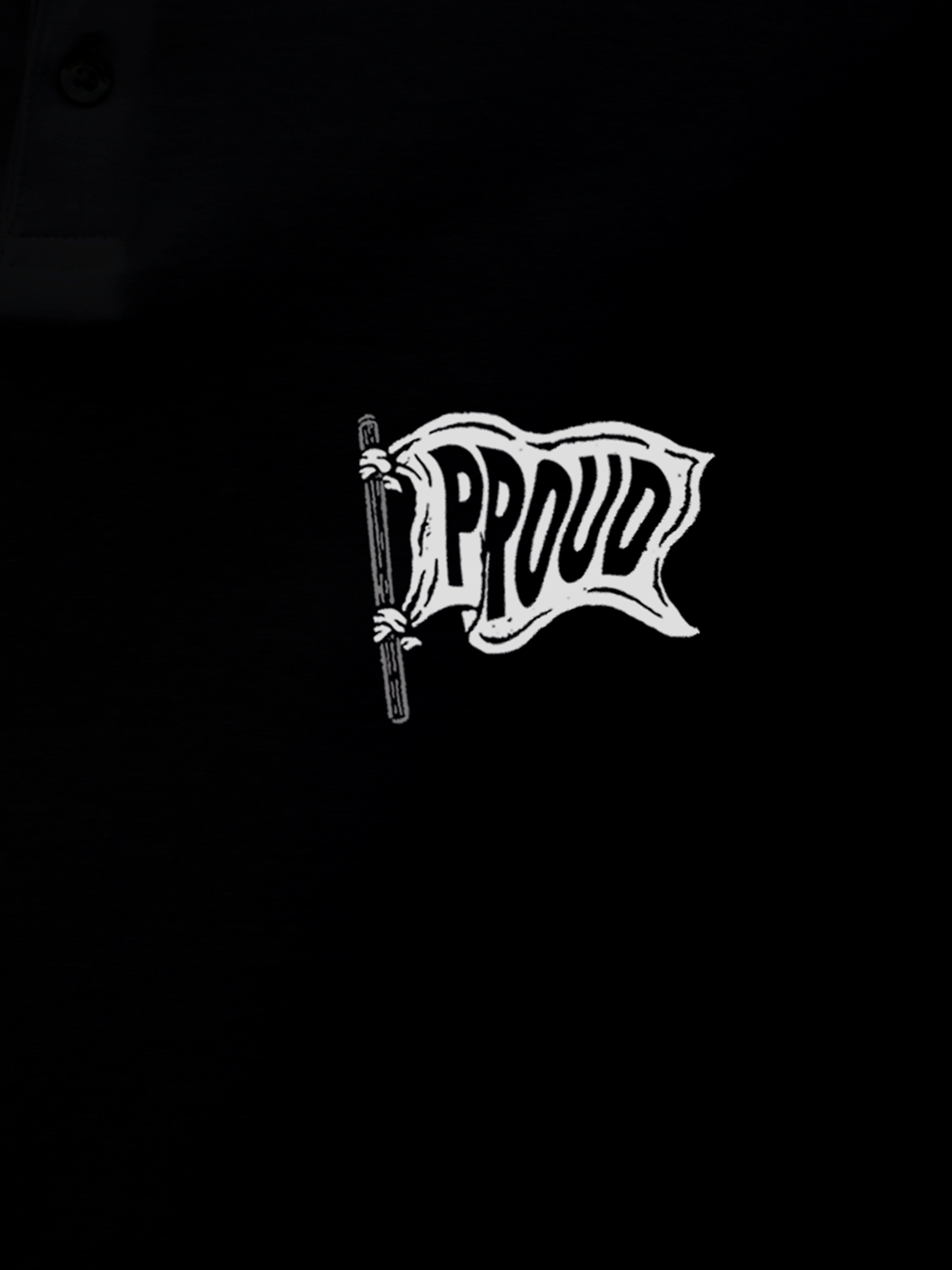 Close up of 'Proud' design on Men's Black Polo T-shirt, highlighting intricate details and vibrant print.