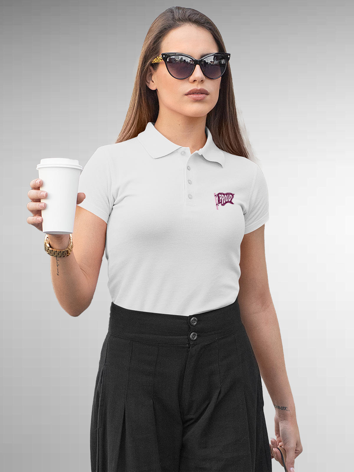 Model wearing Women's White Polo T-shirt with 'Proud' design, offering effortless style and premium comfort