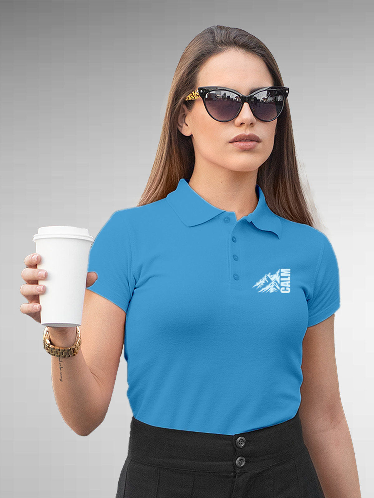 Model wearing Women's Blue Polo T-shirt with 'Calm' design, offering effortless style and premium comfort