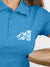 Close up of 'Calm' design on Women's Blue Polo T-shirt, highlighting intricate details and vibrant print.