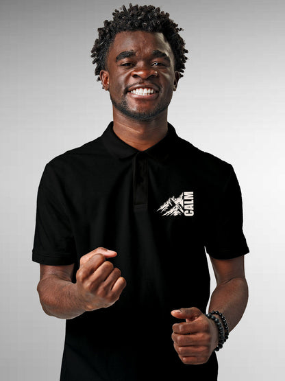 Model wearing Men's Black Polo T-shirt with 'Calm' design, offering effortless style and premium comfort