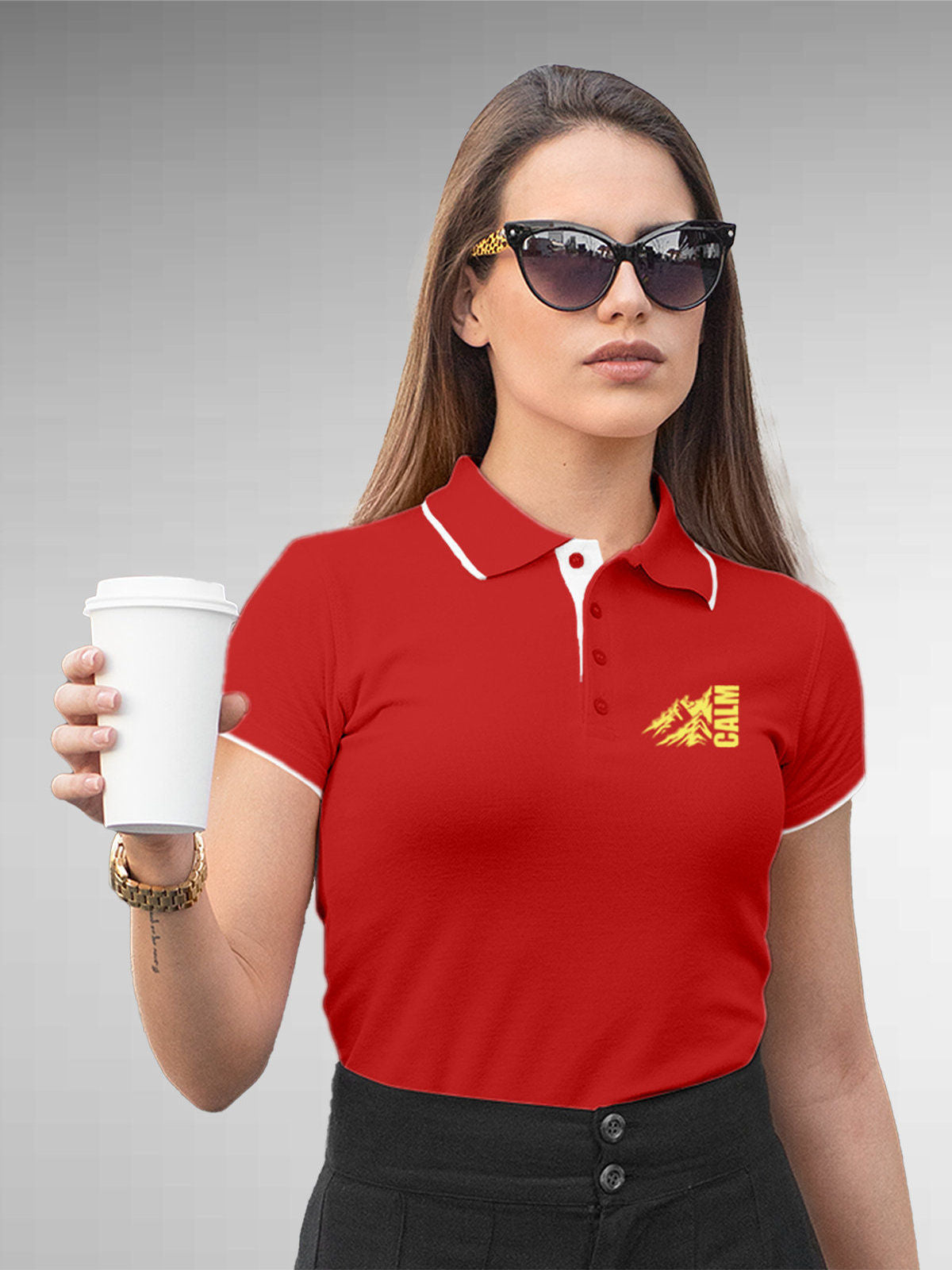 Model wearing Women's Red Polo T-shirt with 'Calm' design, offering effortless style and premium comfort