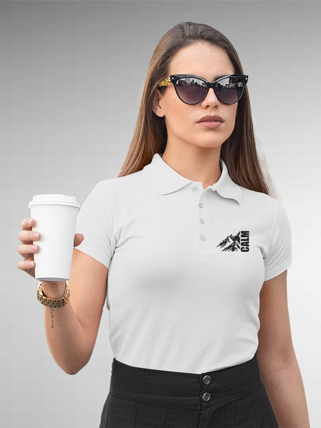 Model wearing Women's White Polo T-shirt with 'Calm' design, offering effortless style and premium comfort