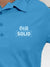 Close up of 'Still Solid' design on Women's Blue Polo T-shirt, highlighting intricate details and vibrant print.