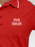 Close up of 'Still Solid' design on Women's Red Polo T-shirt, highlighting intricate details and vibrant print.