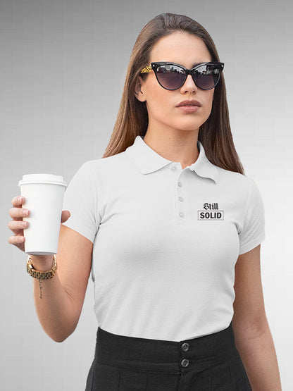 Model wearing Women's White Polo T-shirt with 'Still Solid' design, offering effortless style and premium comfort