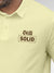Close up of 'Still Solid' design on Men's Yellow Polo T-shirt, highlighting intricate details and vibrant print.