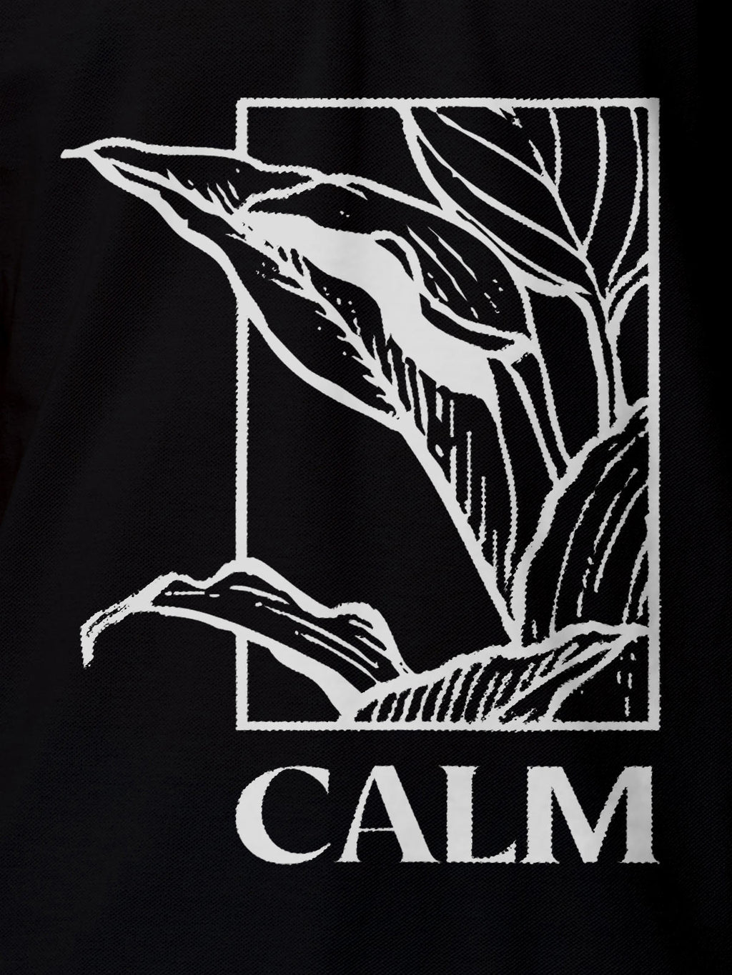 Close up of 'Calm' design on Men's Black Polo T-shirt, highlighting intricate details and vibrant print.