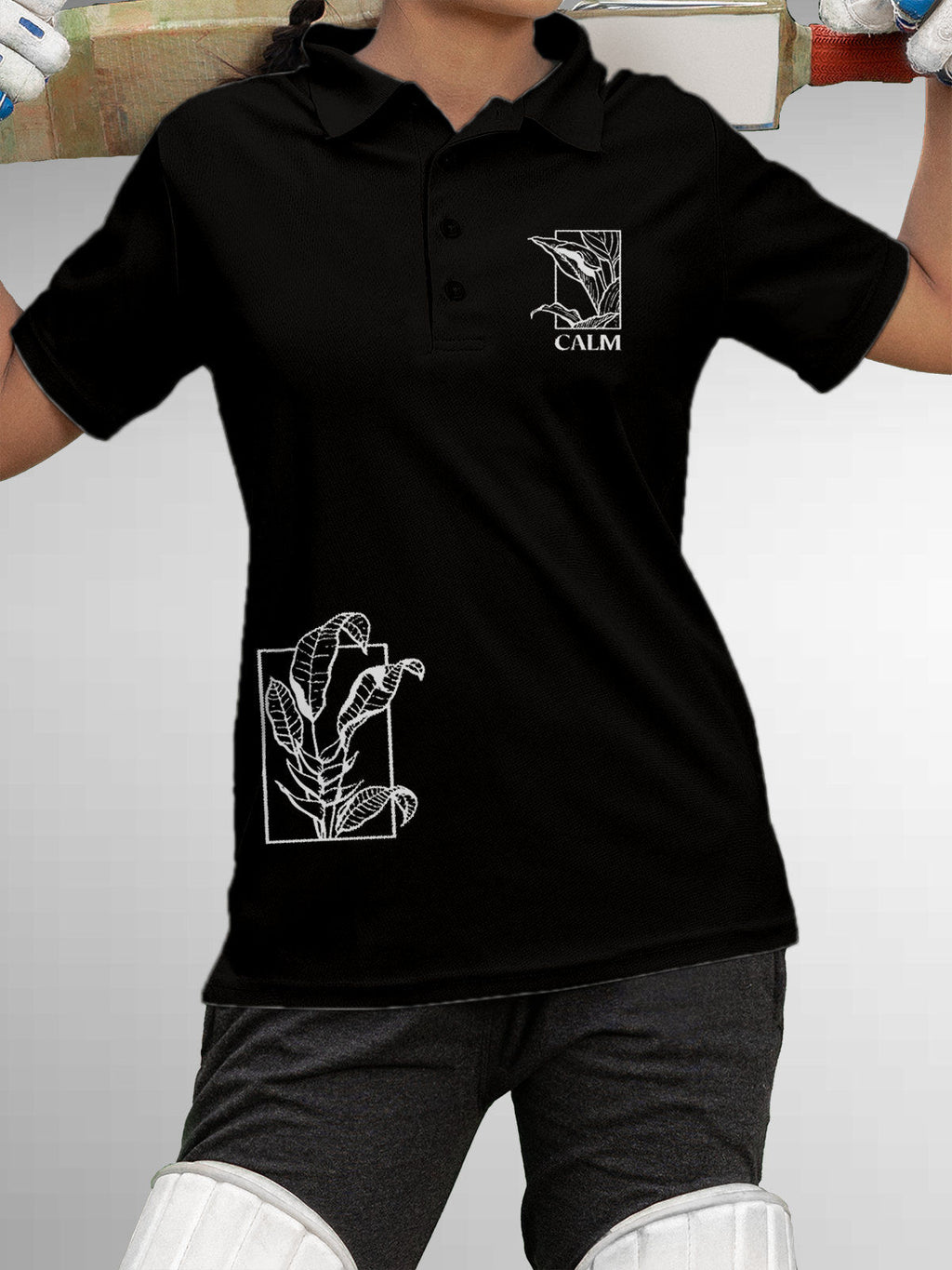 Model wearing Women's Black Polo T-shirt with 'Calm' design, offering effortless style and premium comfort