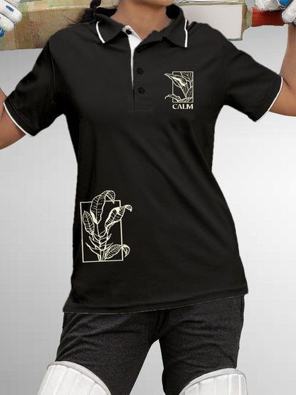 Model wearing Women's Dark Grey Polo T-shirt with 'Calm' design, offering effortless style and premium comfort