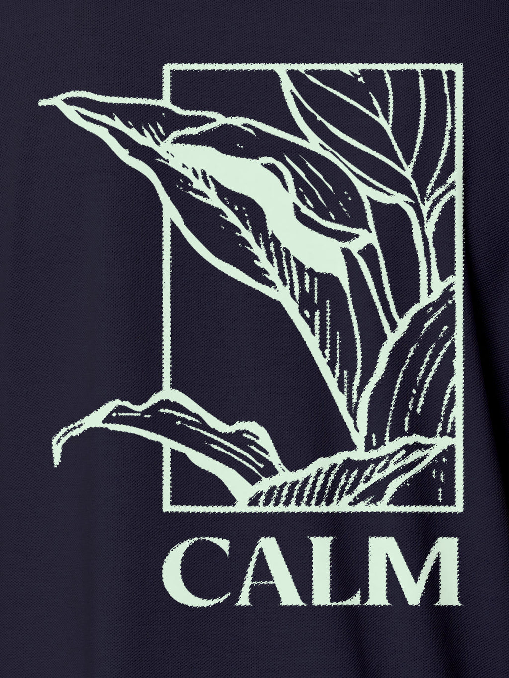 Close up of 'Calm' design on Women's Navy Blue Polo T-shirt, highlighting intricate details and vibrant print.