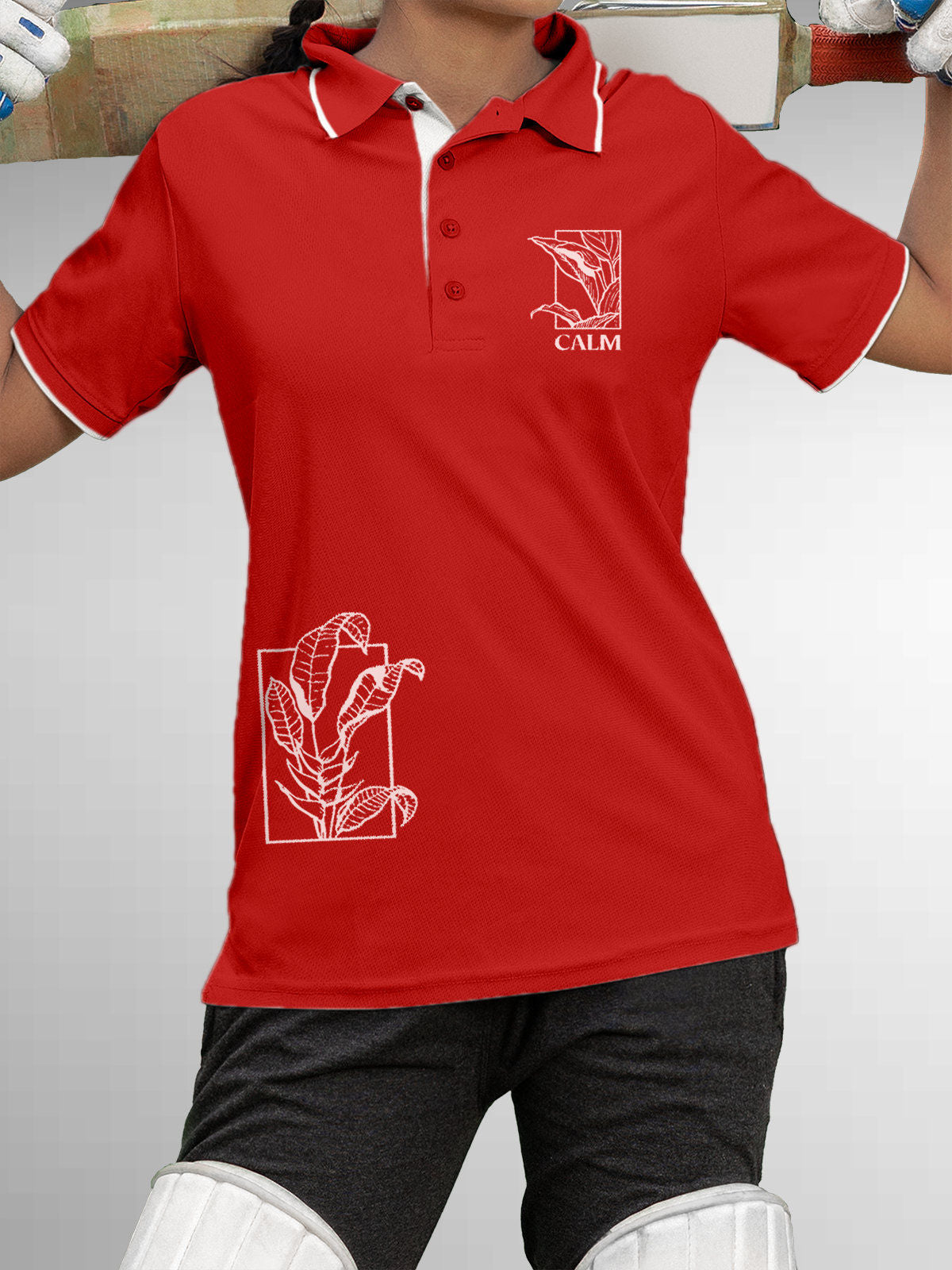 Model wearing Women's Red Polo T-shirt with 'Calm' design, offering effortless style and premium comfort