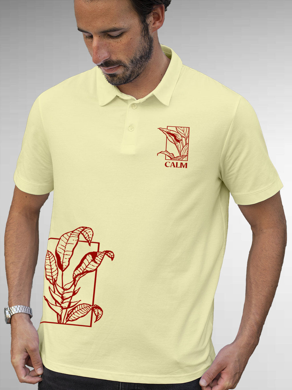Model wearing Men's Yellow Polo T-shirt with 'Calm' design, offering effortless style and premium comfort