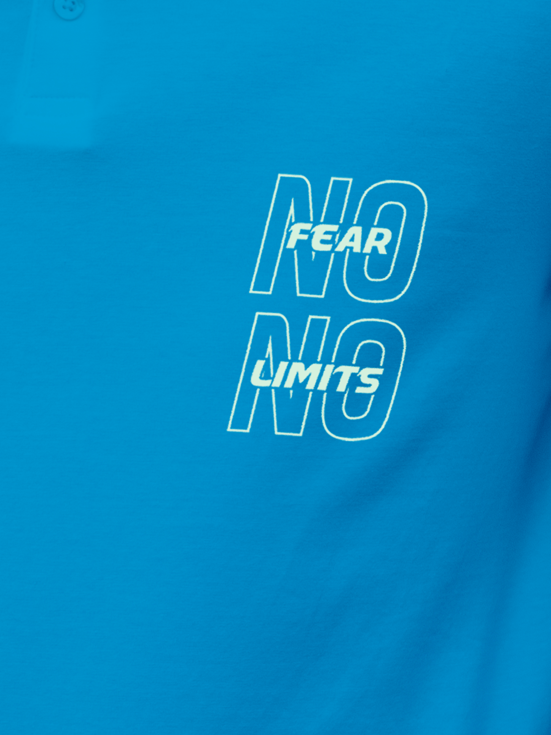 Close up of 'No Fear No Limits' design on Men's Blue Polo T-shirt, highlighting intricate details and vibrant print.