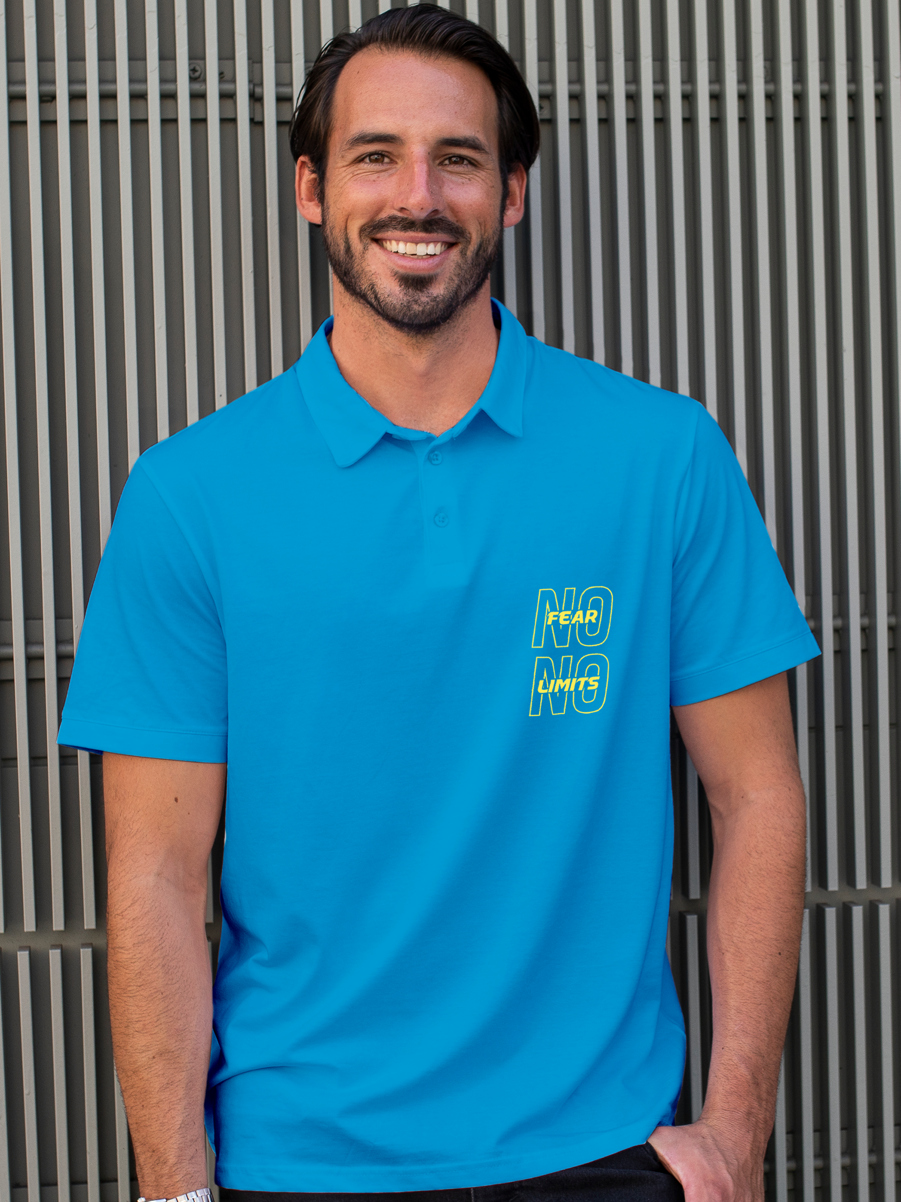 Model wearing Men's Blue Polo T-shirt with 'No Fear No Limits' design, offering effortless style and premium comfort