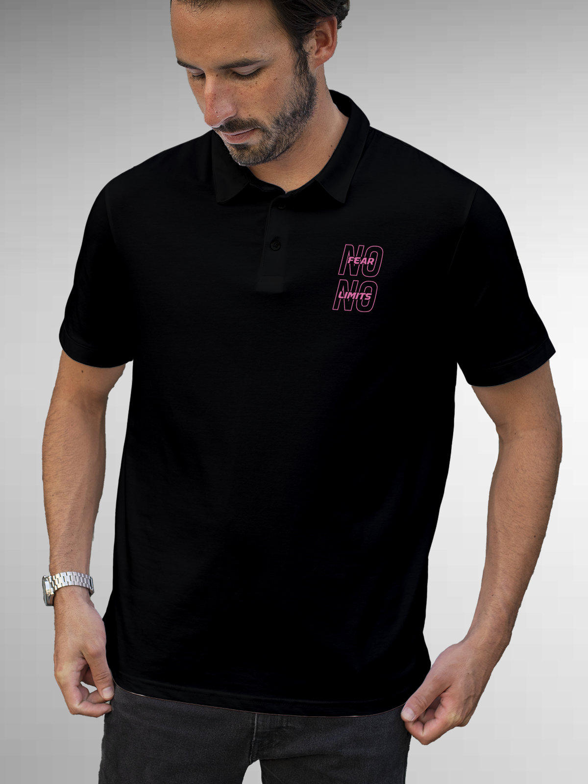 Model wearing Men's Black Polo T-shirt with 'No Fear No Limits' design, offering effortless style and premium comfort
